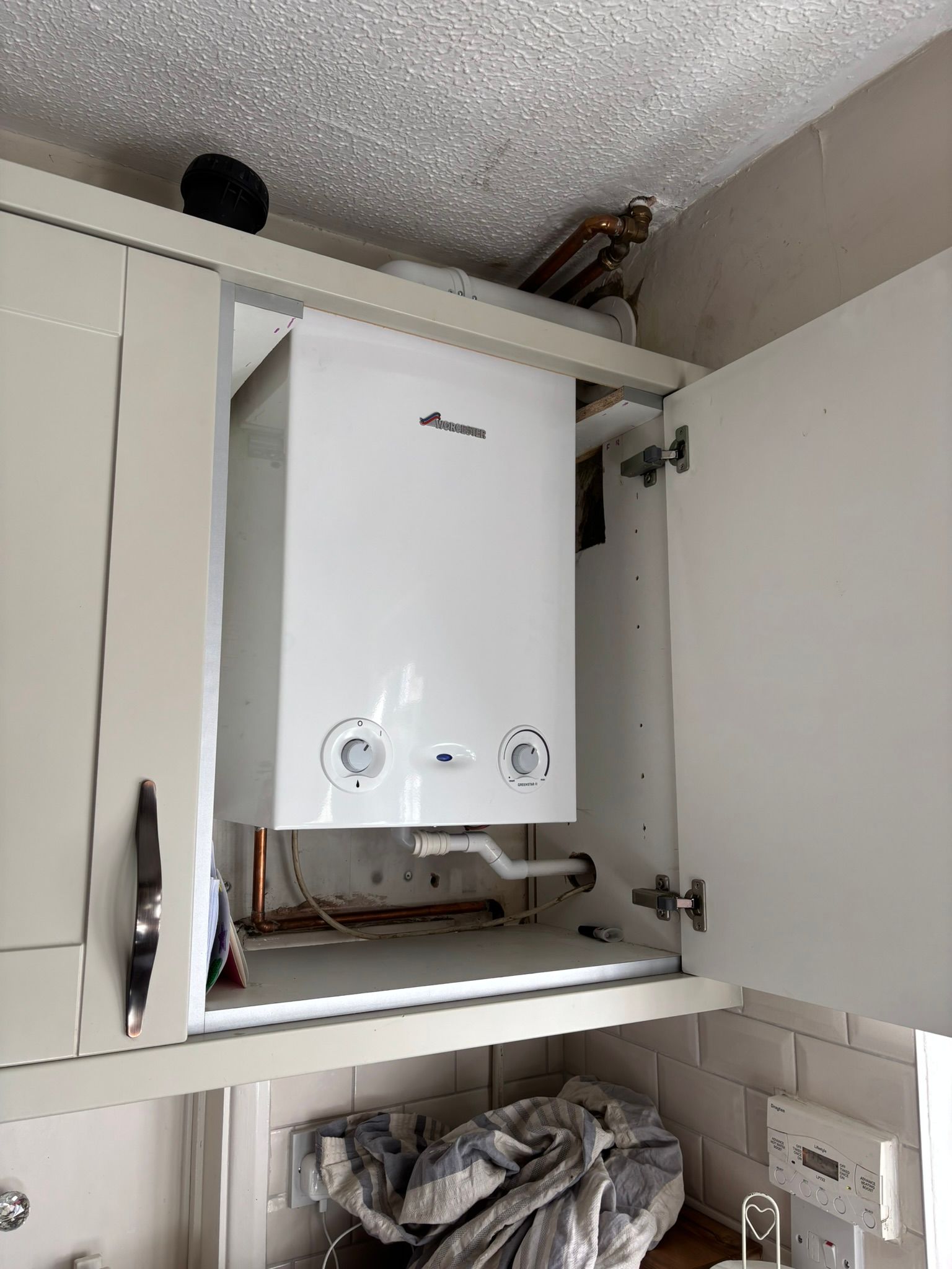 Boiler installion in cupboard, located in tilehurst, before & after images