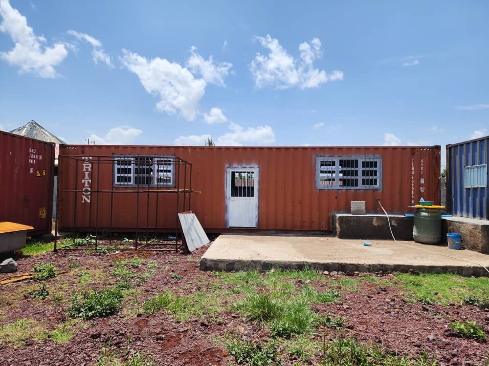 A shipping container is being used as a house.