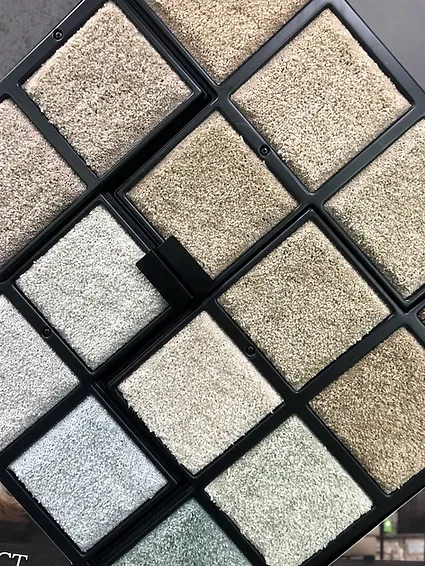 There are many different types of carpets in this display case.