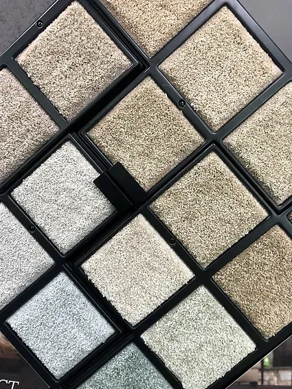 There are many different types of carpets in this display case.