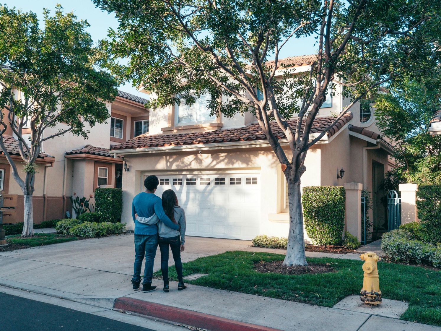 family happy with house