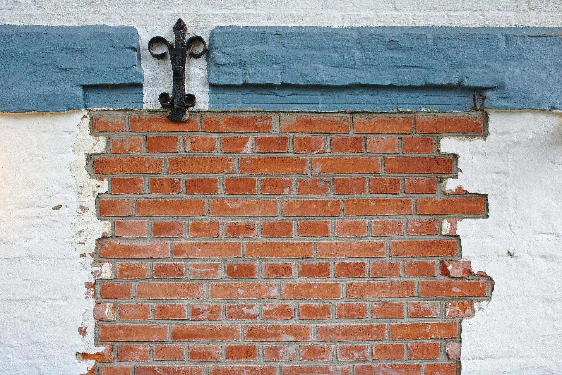 Brick wall partly plastered needing historic structure waterproofing in Fremont, CA by Authentic Res
