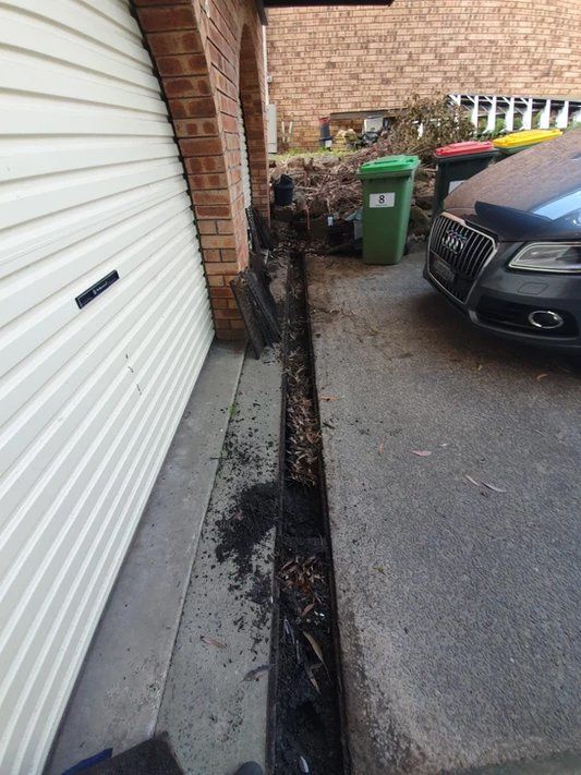 Before Cleaning The Gutter On The Garage — TK Guttercleaning in Hamlyn Terrace, NSW