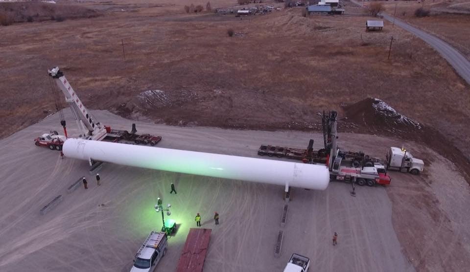 Crane setting propane tank