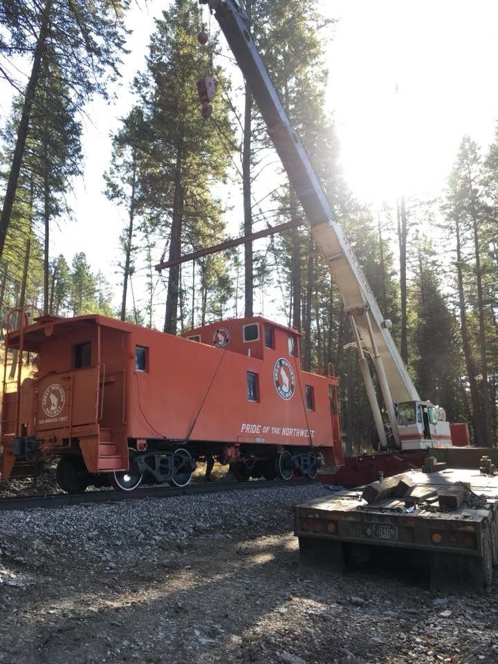 Crane setting caboose