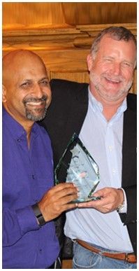 IPC staff receiving the Volunteer of the Year award