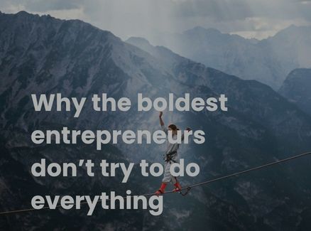 White text on image of mountains and person walking on tightrope