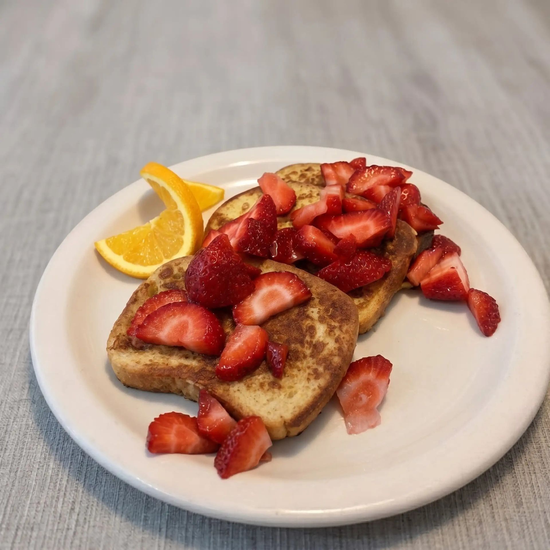 French toast topped with strawberries served at Hollywood Family Café in Lodi