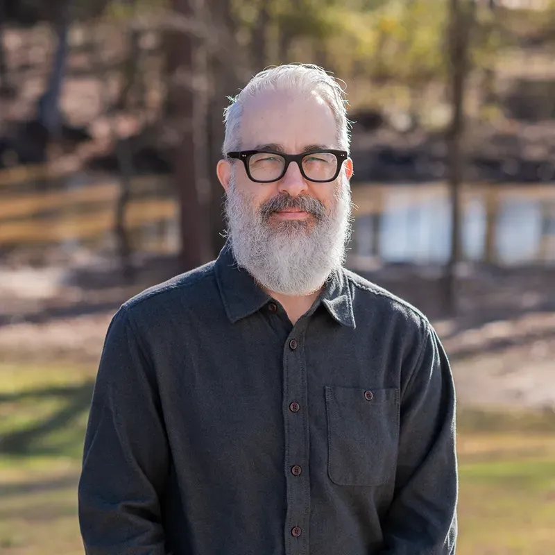 A person with a grey beard