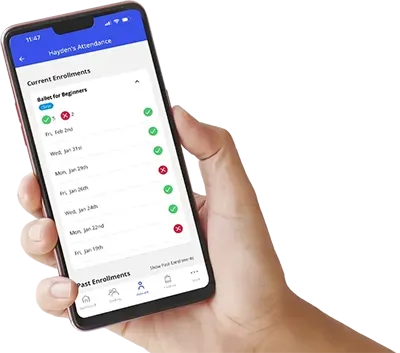 A person is holding a cell phone in their hand.