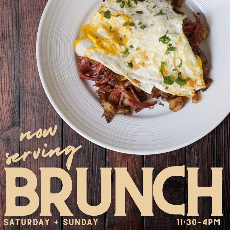 a brunch plate with corned beef and hash