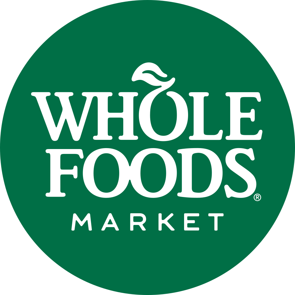 Whole Foods Market logo in white on a green circle
