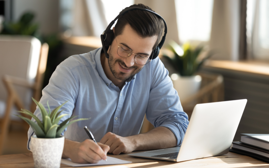 A group of people are walking down the street.