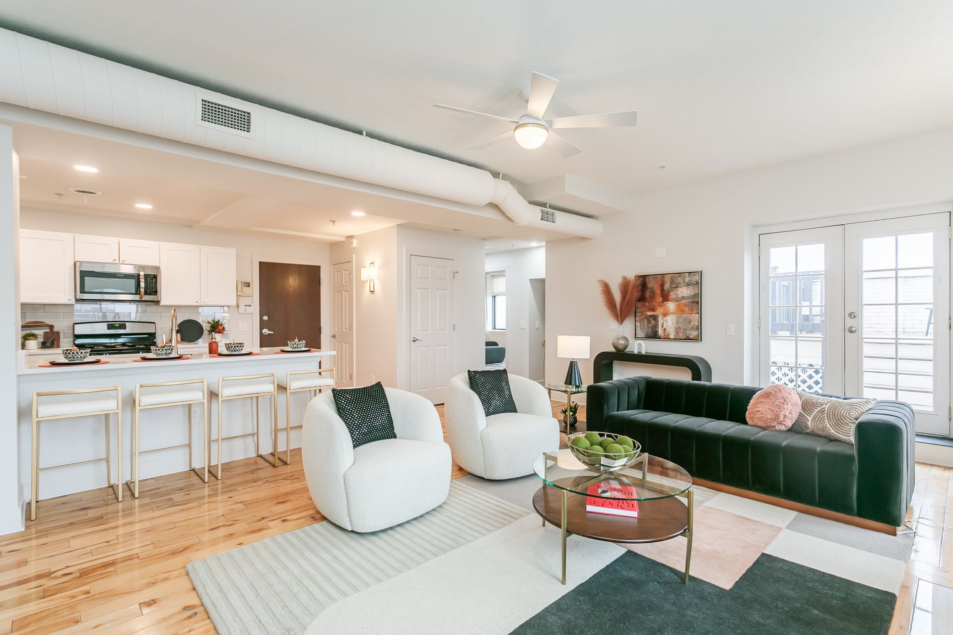 Living room and kitchen with breakfast bar