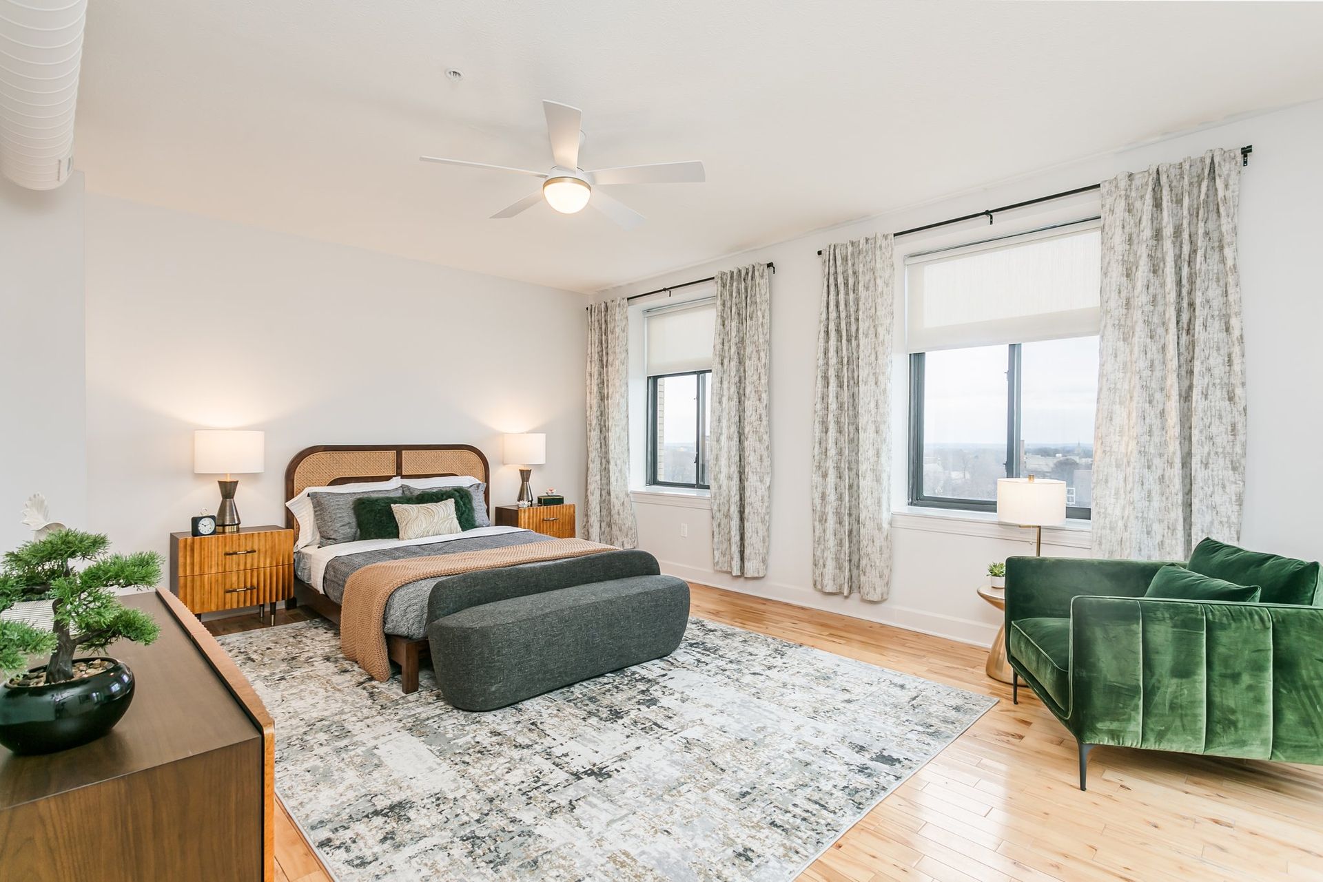 Bedroom with two large windows