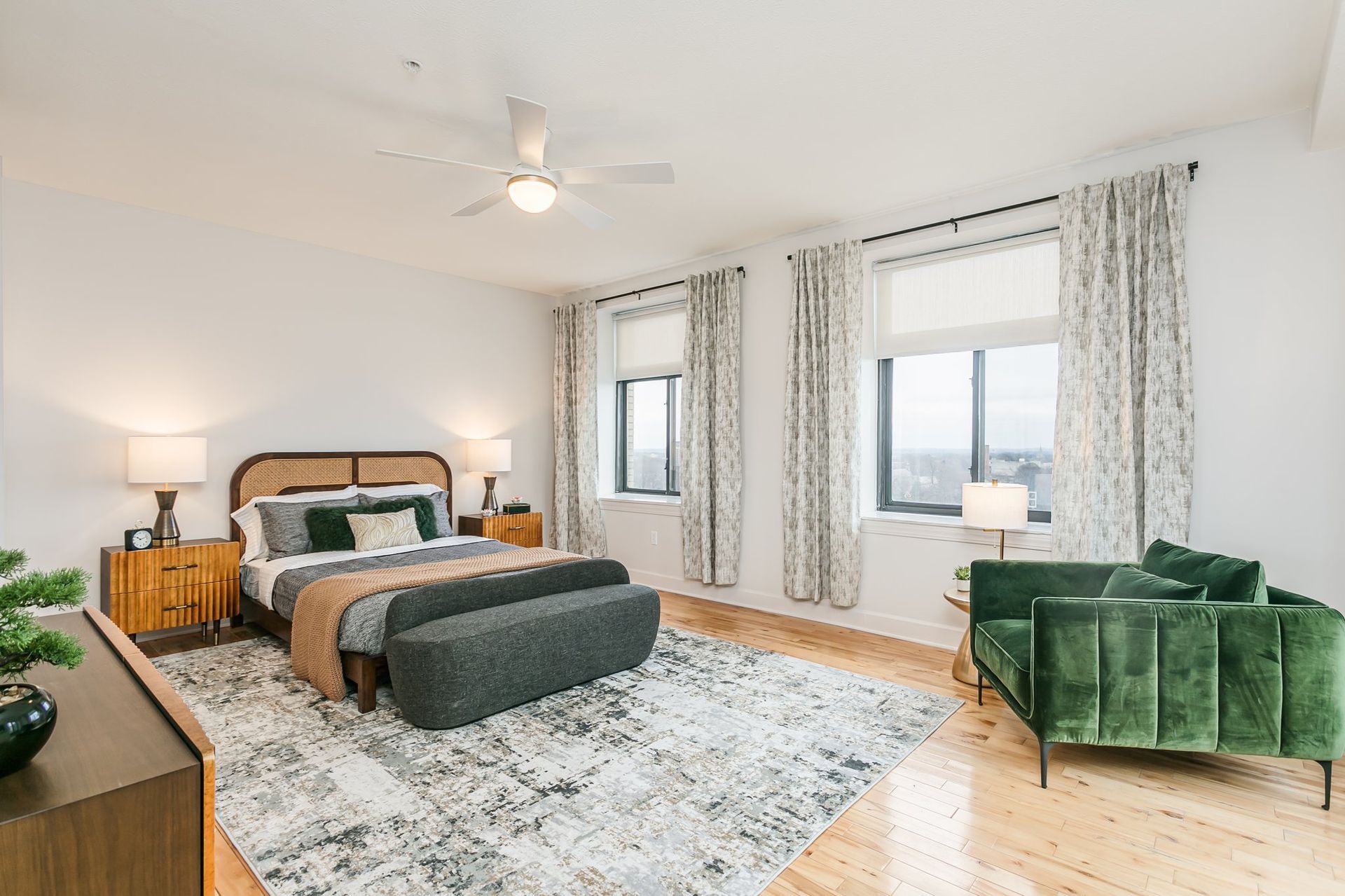 Bedroom with two large windows