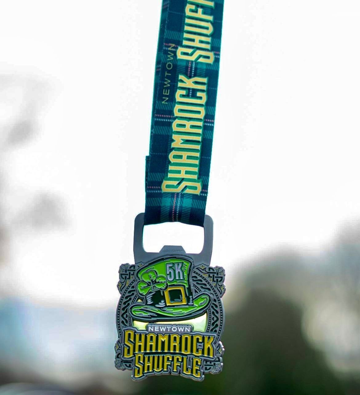 A medal that says shamrock shuffle on it