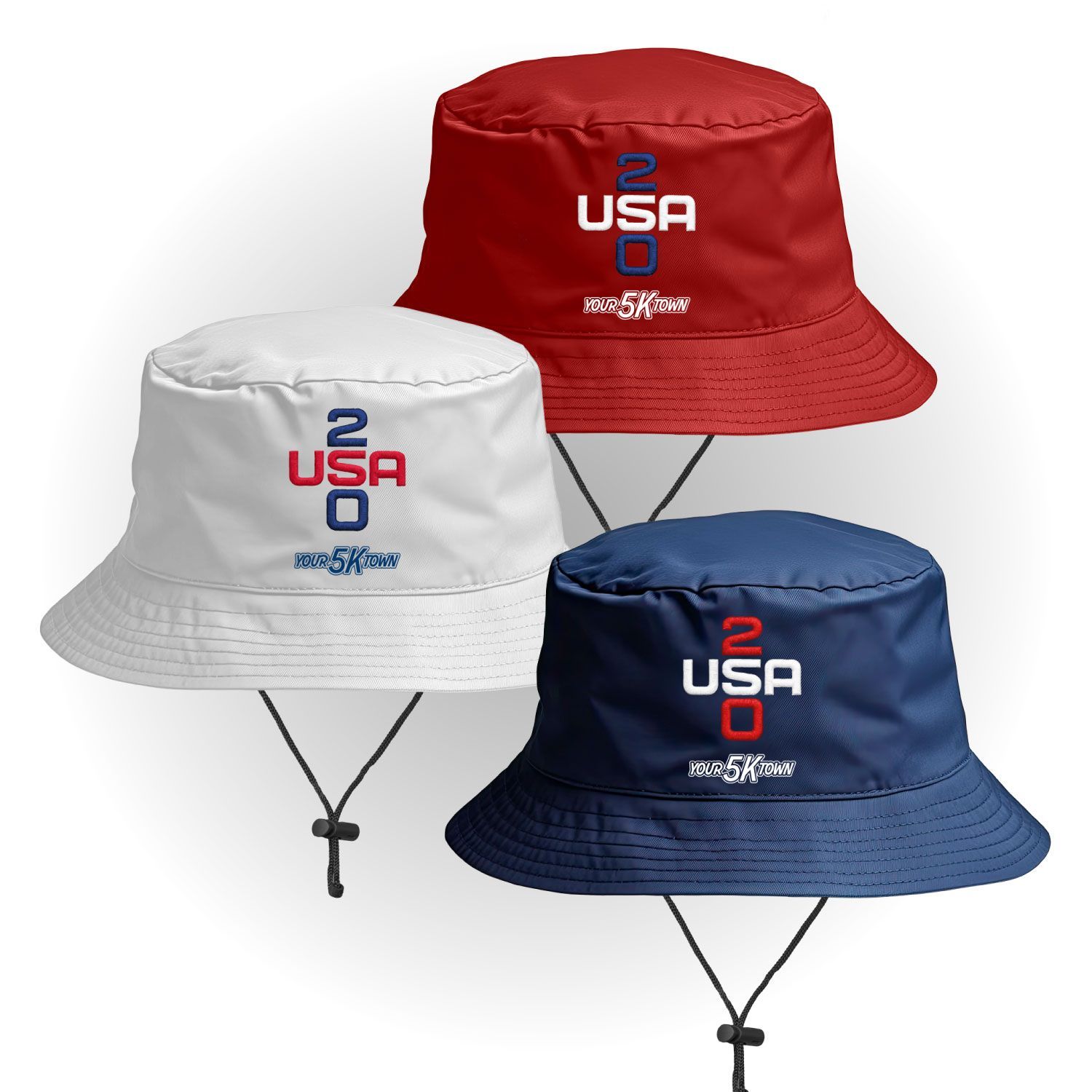 Three bucket hats in white, red, and navy, each with a USA 250 design and chin cord.