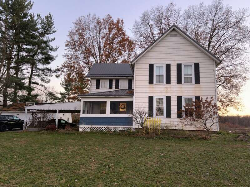 House with White Siding and Brick Chimney — Kent, OH — ARC Contracting of Ohio LLC