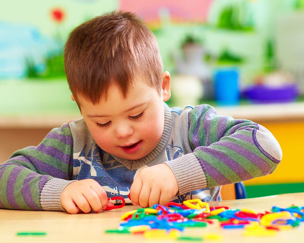 Special needs child playing in kindergarten after special education legal help from the Law Office of Mark W. Voigt in Pennsylvania. Special needs child playing in kindergarten after special education legal help from the Law Office of Mark W. Voigt in Pennsylvania.