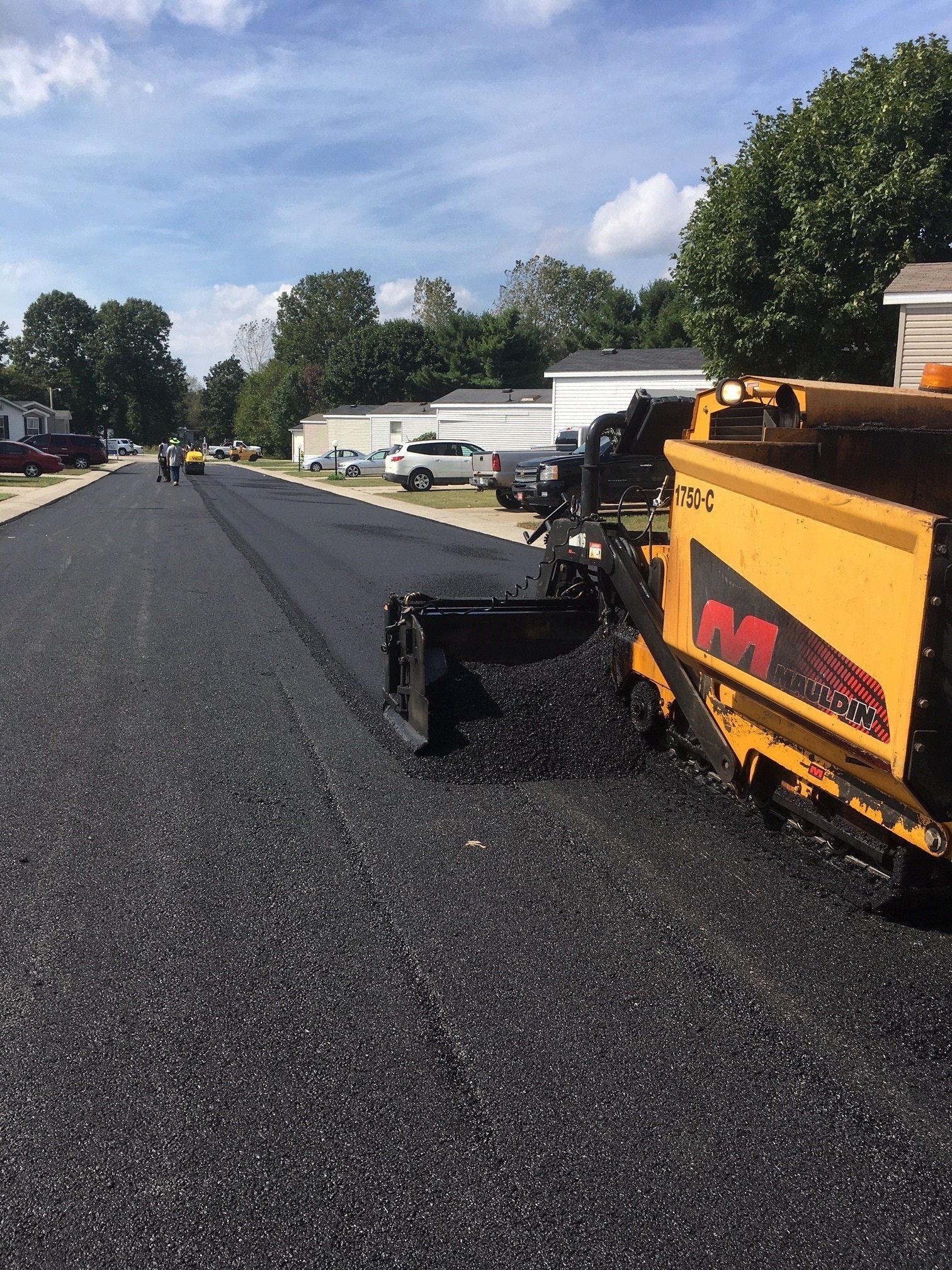Laying Asphalt On The Road — Houston, TX — HEV Asphalt Paving Co.