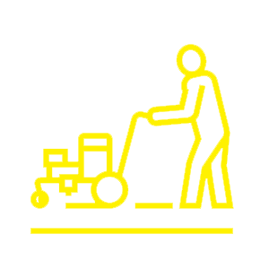 A man is pushing a cart with boxes on it.