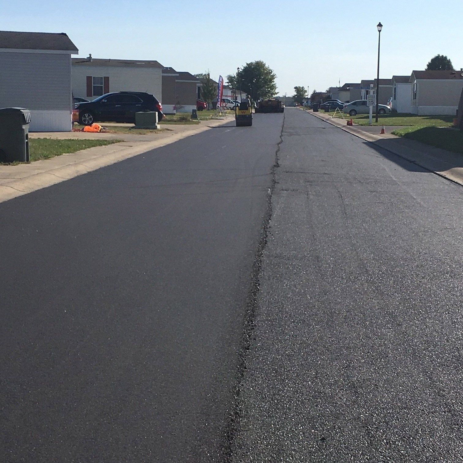 A team demonstrating asphalt maintenance in Houston