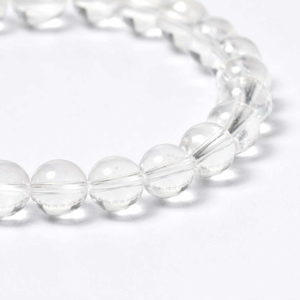 Handgemaakte bergkristal armband met transparante kralen van 6 mm