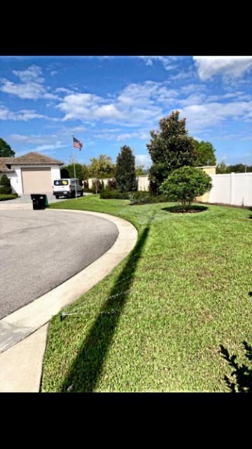 Healthy residential lawn with professional irrigation system