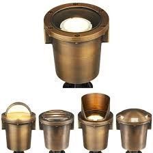 Four brass-and-silver recessed light fixtures in different styles, shown against a white background
