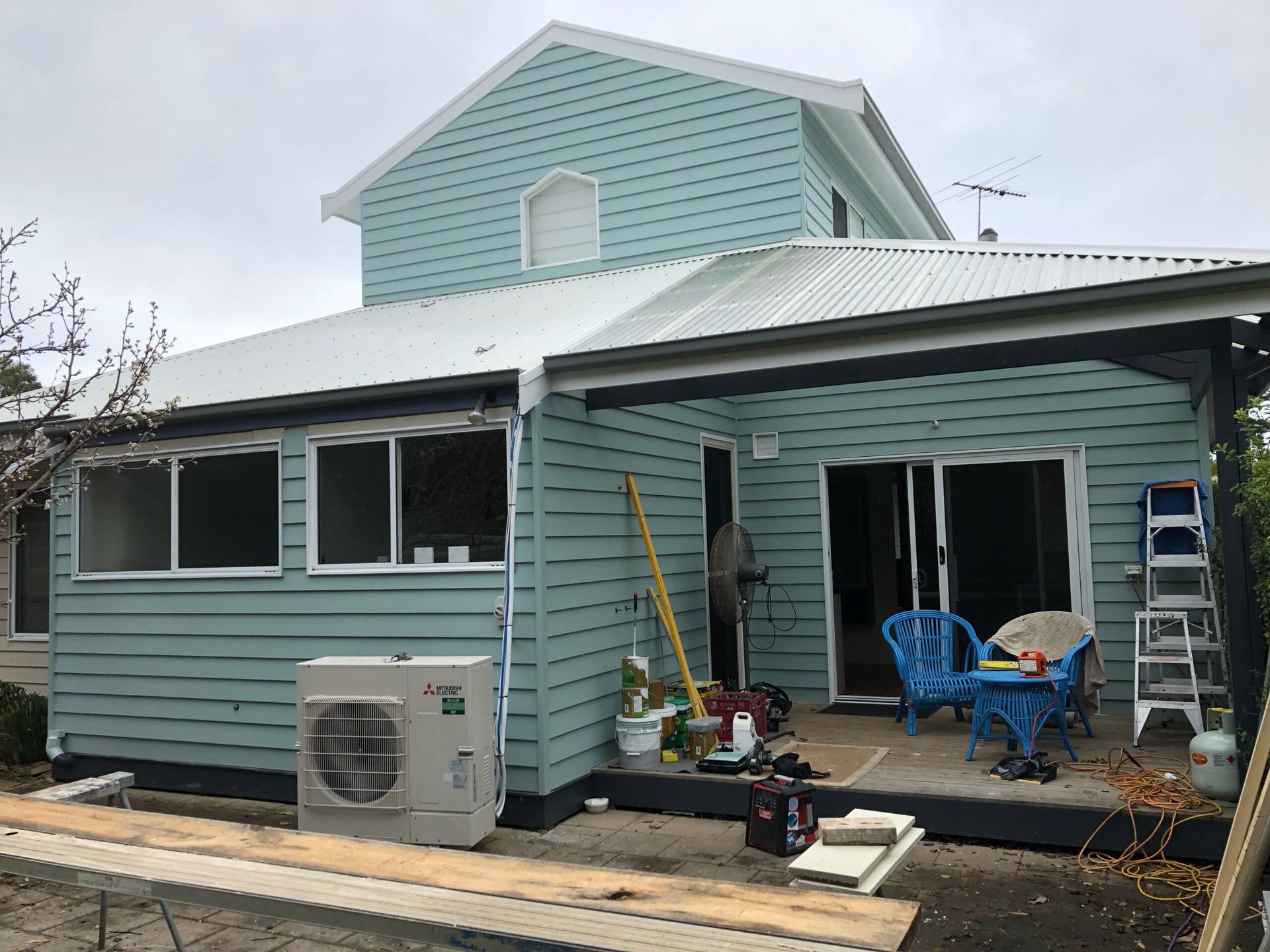 Light Blue House Exterior with Patio — NoDrip Plumbing & Roofing In Port Macquarie, NSW