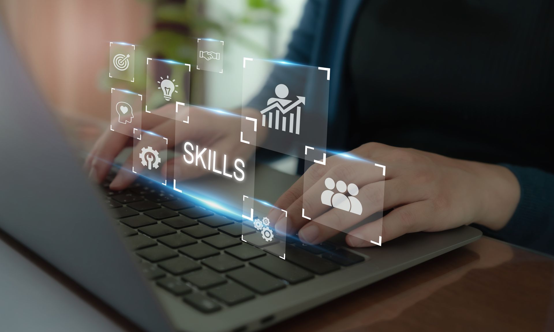 skills, and people portrayed on a laptop