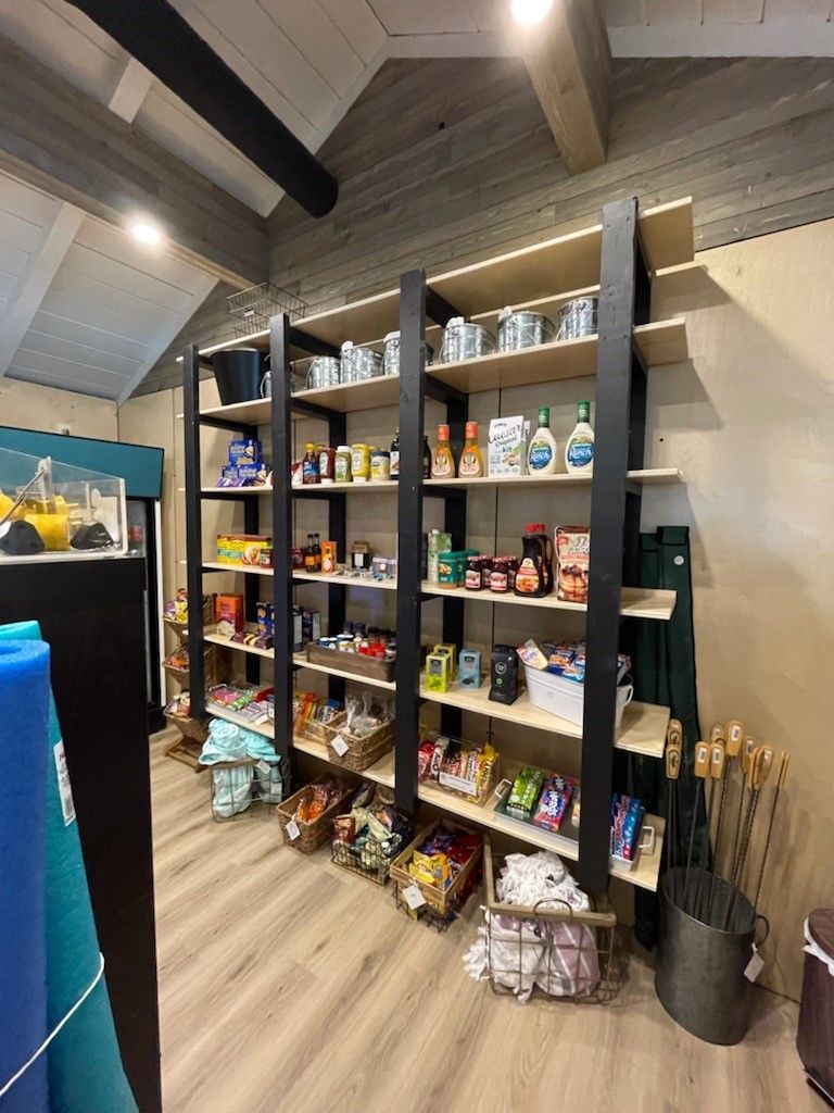 A room filled with shelves filled with lots of items.