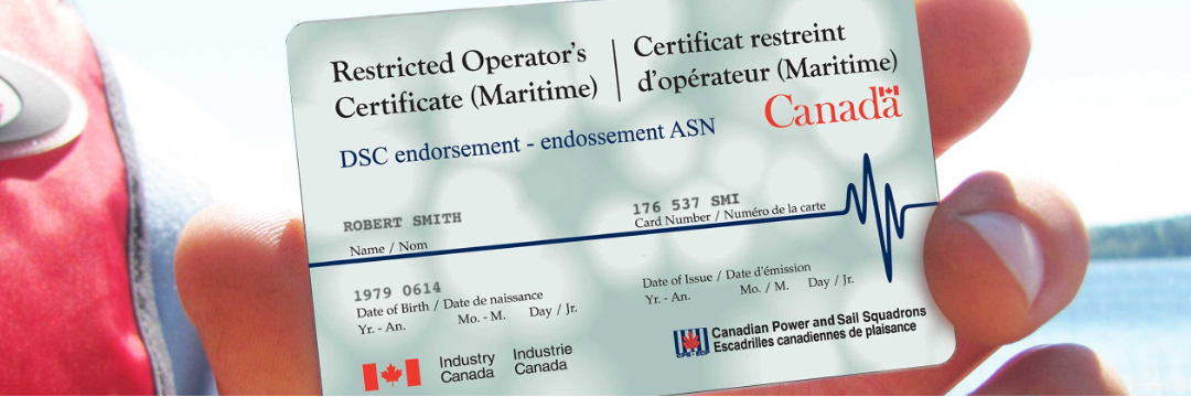 A person holding a card labeled