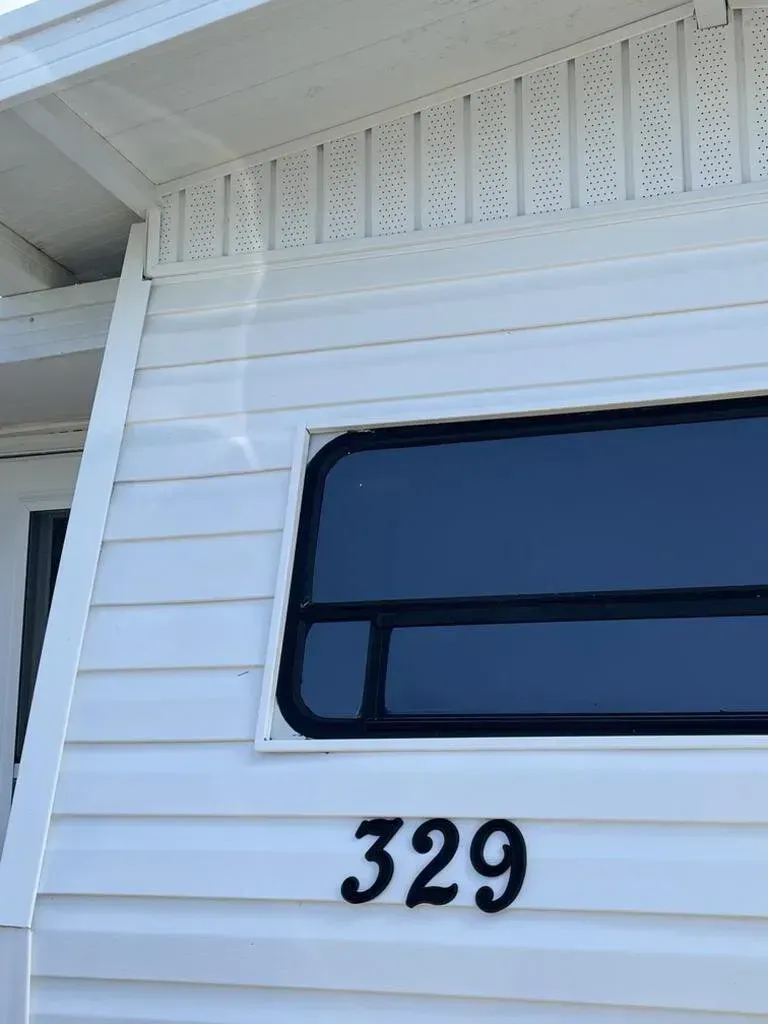 White house with black numbers 