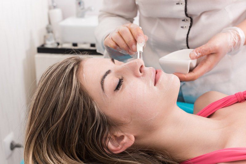 woman getting professional facial