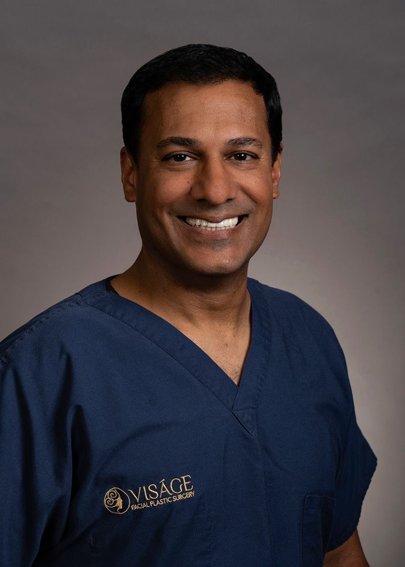 Portrait of Dr. Anand D. Patel, double board-certified facial plastic surgeon.