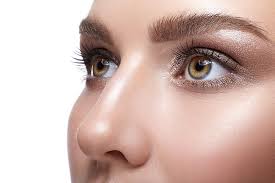 woman before and after rhinoplasty