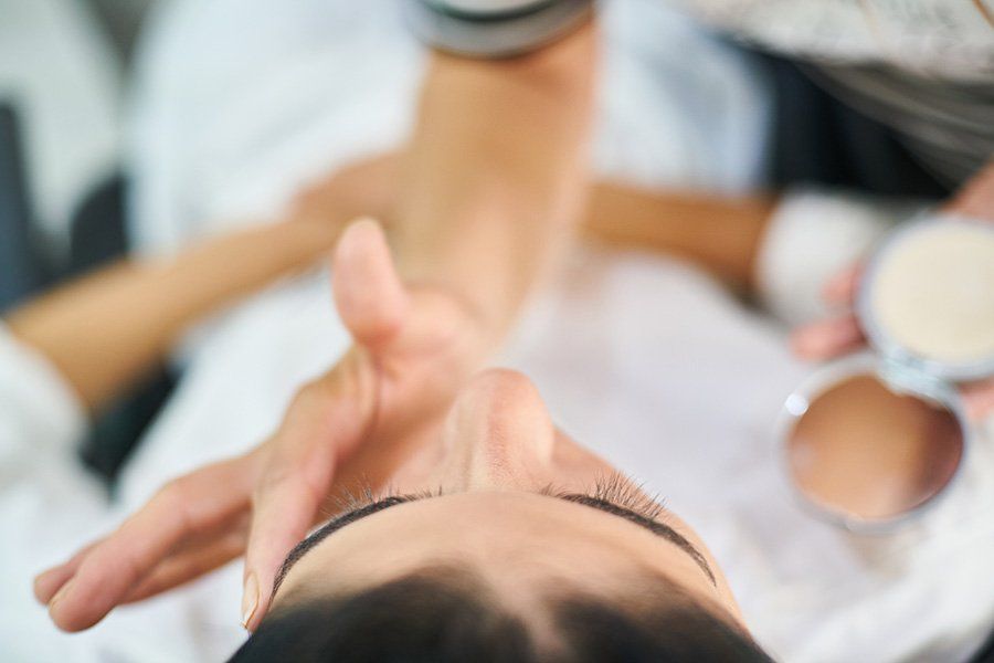 woman applying skincare