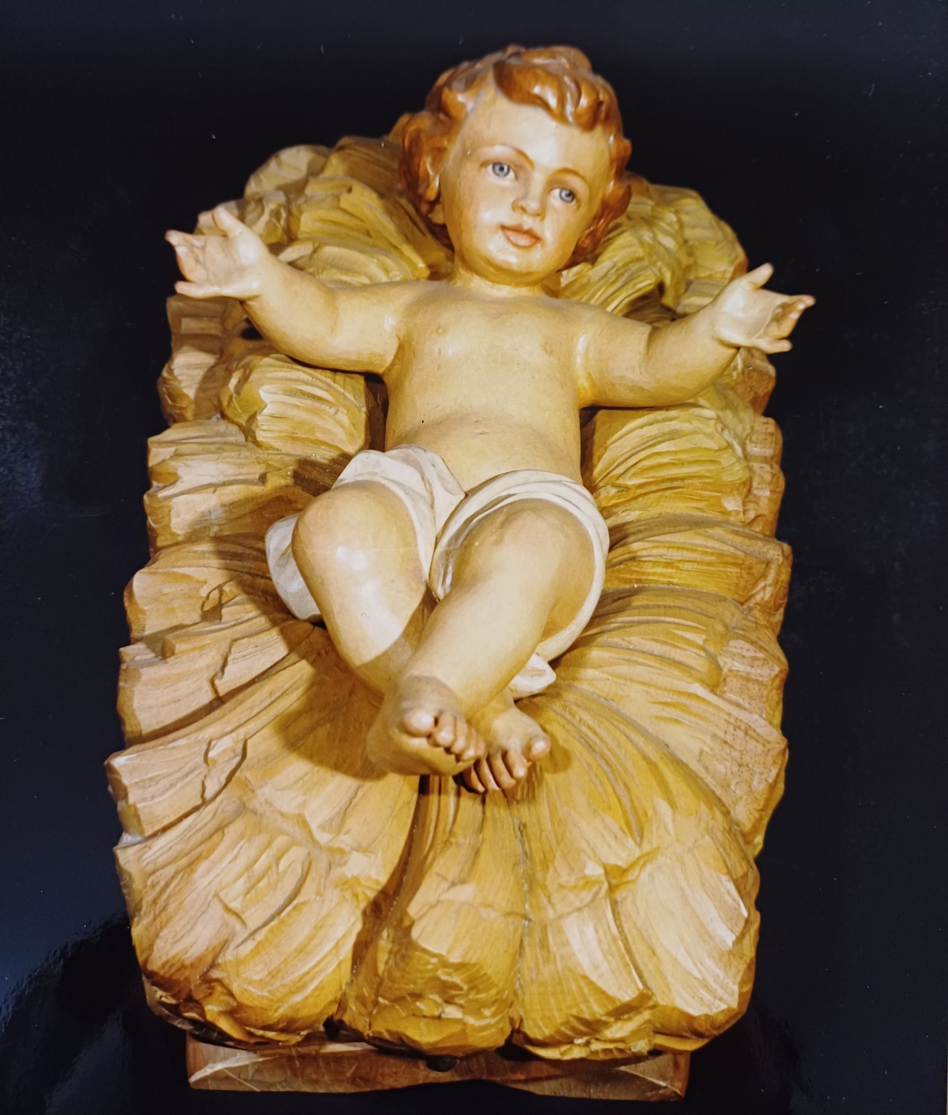 Gesù bambino in legno scolpito