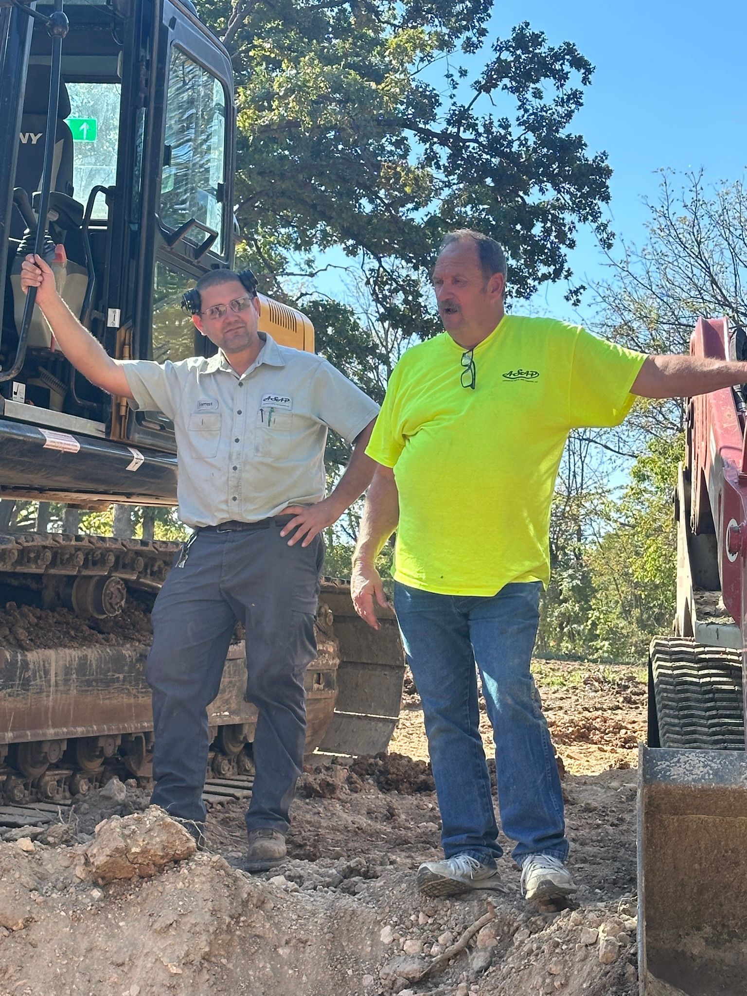 Septic installation crew at a rural property