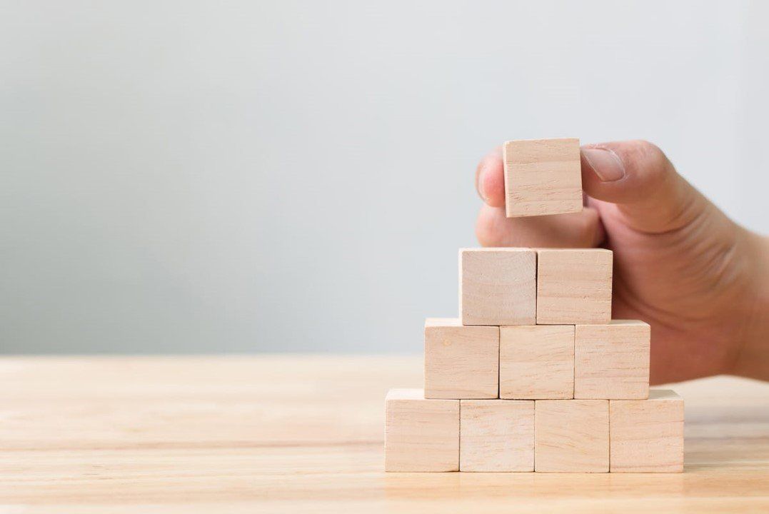 Blocks Being Built into a Pyramid