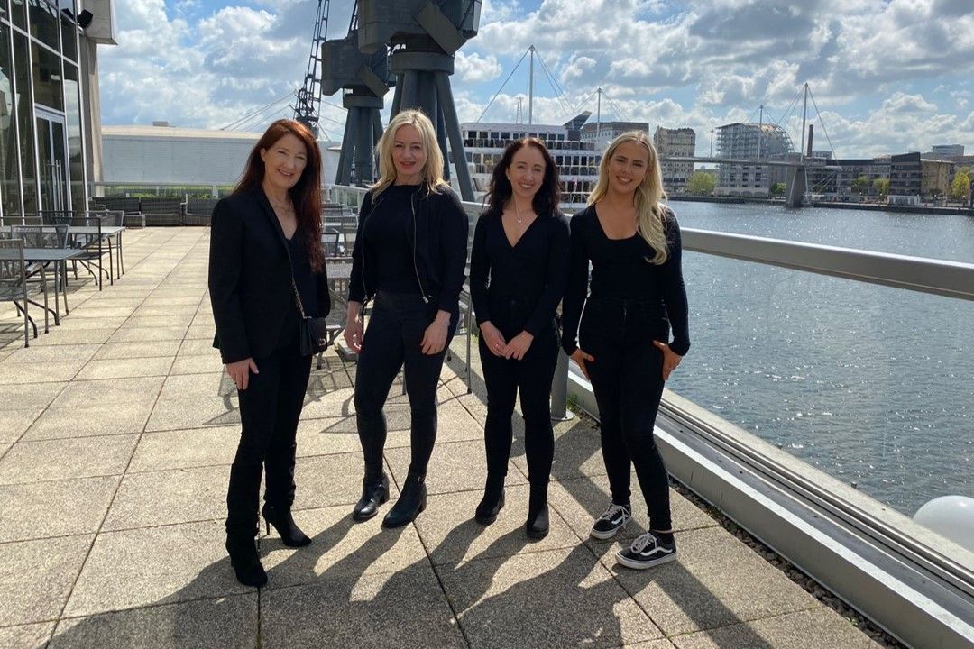 AJF Taxation team standing next on a quay
