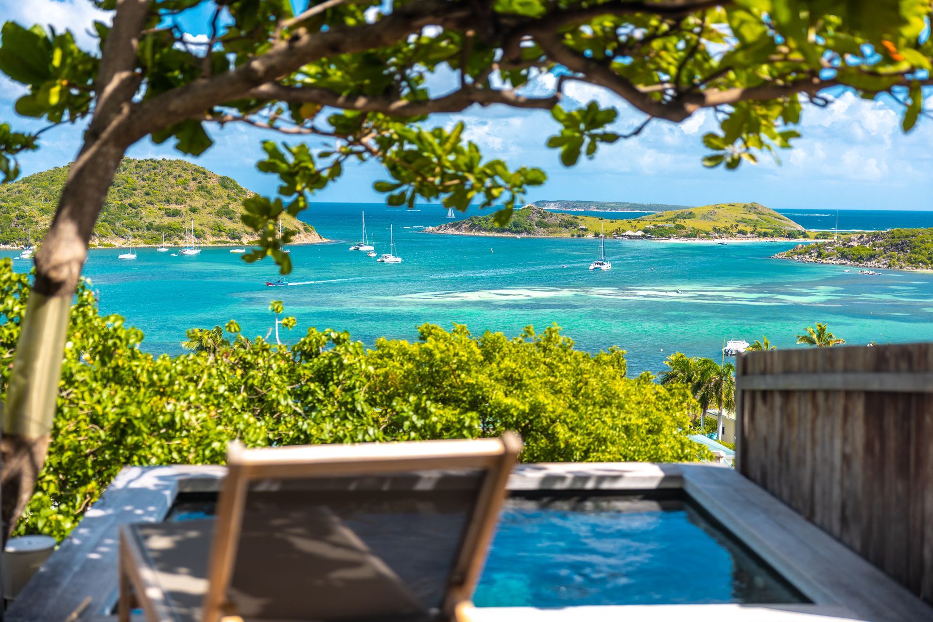 Plunge pool of an Exclusive Suite, with view over the Cul de Sac Bay and Pinel Island