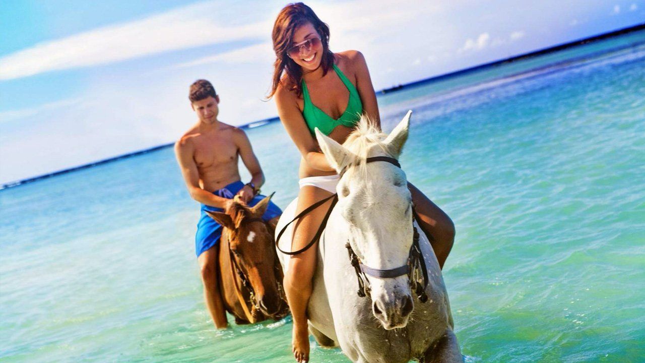 St Martin, FWI, horse riding by the caribbean sea