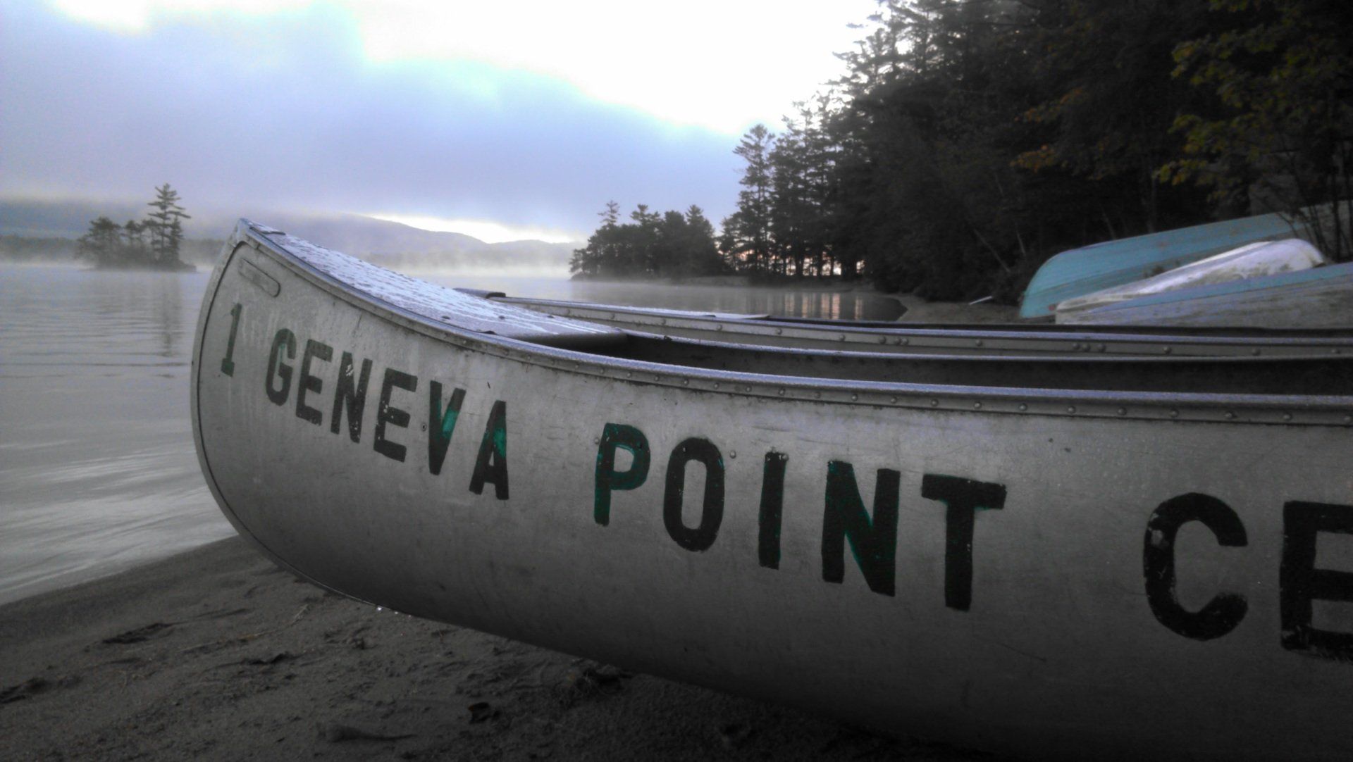 A canoe with the name geneva point on it
