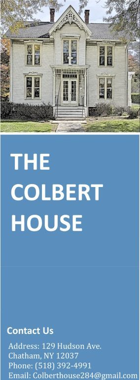 The Colbert House sign with a photo of a stone house and contact information on a blue panel
