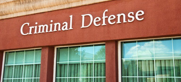 building that says criminal defense