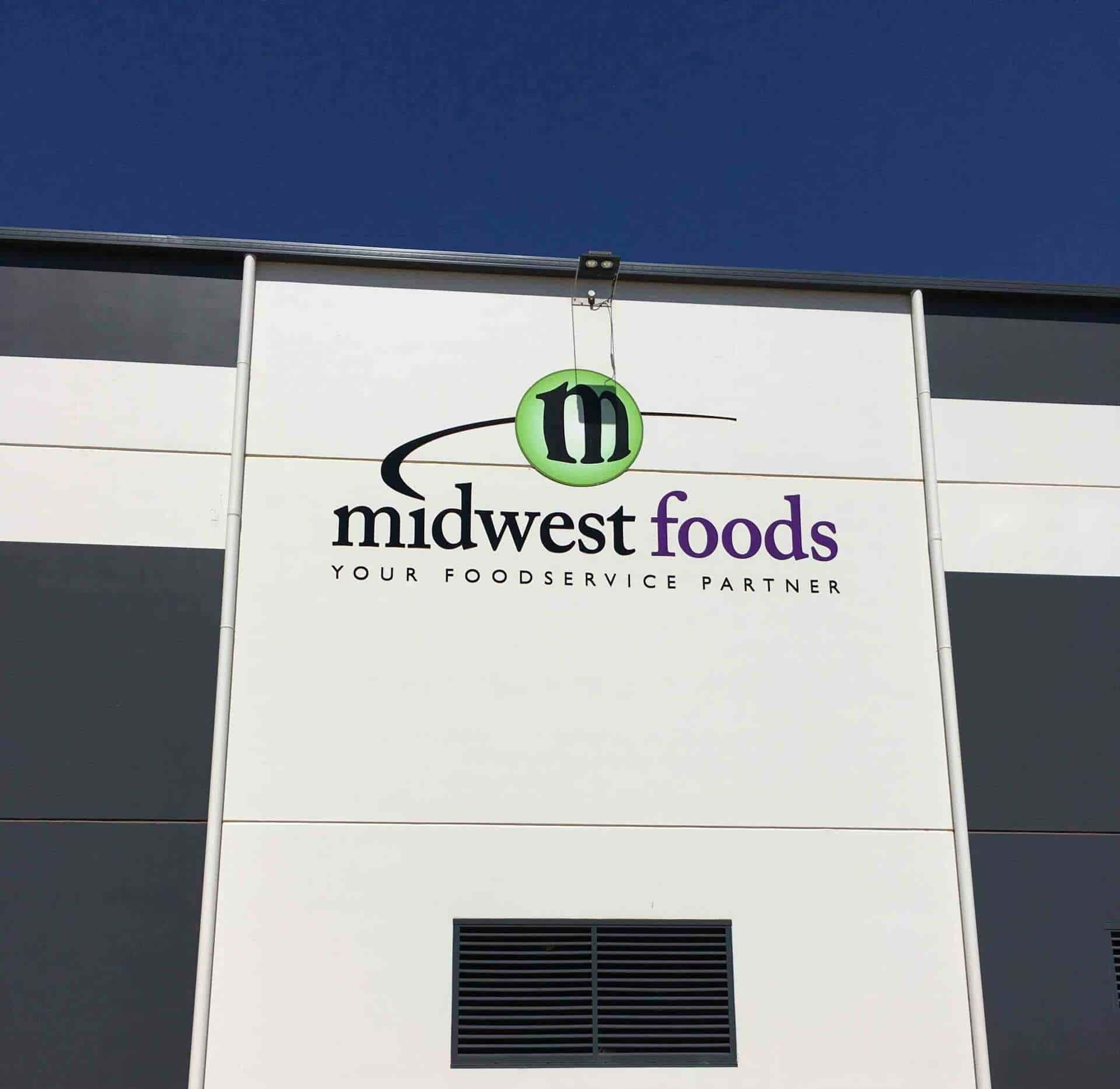 Sign on A White Building