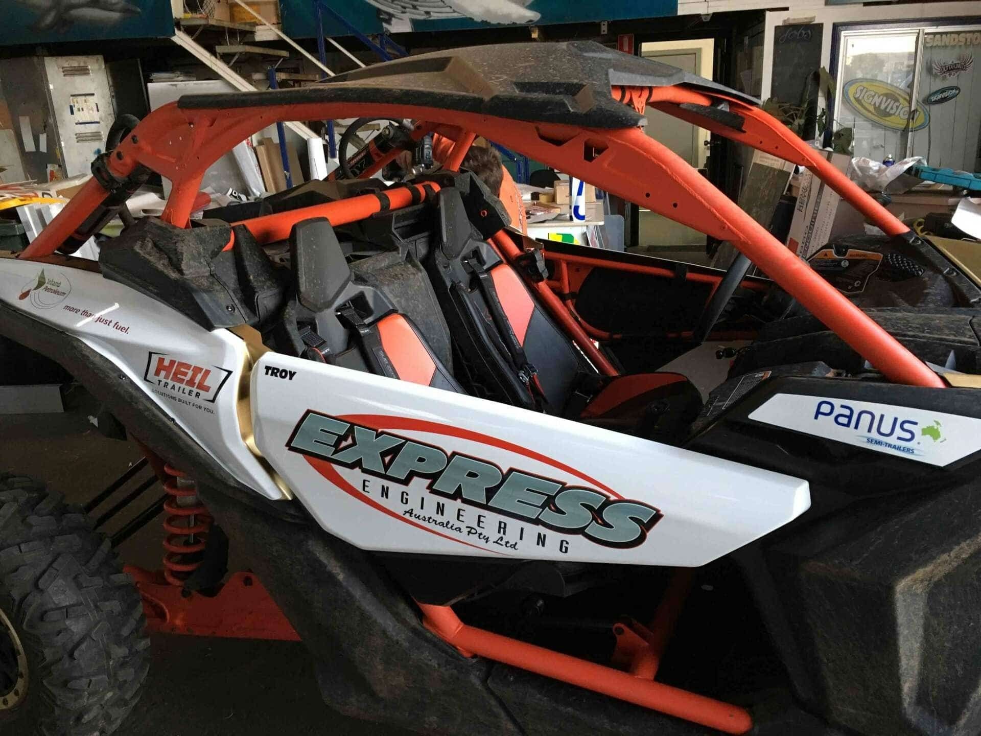 White and Orange Side-By-Side UTV with Express Engineering Logo — Signvision In Dubbo, NSW